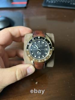 Bulova Oceanographer GMT Automatic Root Beer. Barely worn, retails for over $800