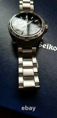 Grand Seiko Sport 9F GMT Quartz 39mm Steel Mens Bracelet Watch Date SBGN005