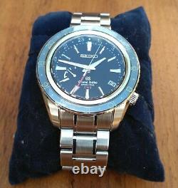 Grand seiko Spring Drive GMT Sbge001 withextra leather lined fitted cordura strap