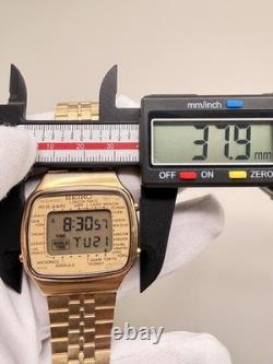 Seiko A708-5000 Vintage World Time GMT Gold-Tone Digital LCD Japan 1980s