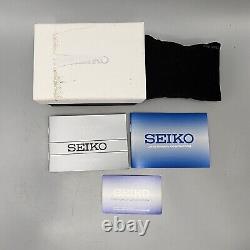 Seiko World Time Watch Men 40mm White Dial Silver Tone Date Alarm Round SPL055