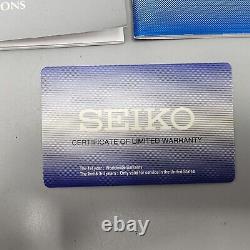 Seiko World Time Watch Men 40mm White Dial Silver Tone Date Alarm Round SPL055