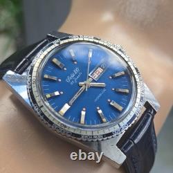 Vintage swiss 100 men's automatic watch day/date GMT Blue dial 1970s