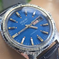 Vintage swiss 100 men's automatic watch day/date GMT Blue dial 1970s