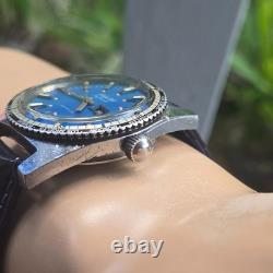 Vintage swiss 100 men's automatic watch day/date GMT Blue dial 1970s
